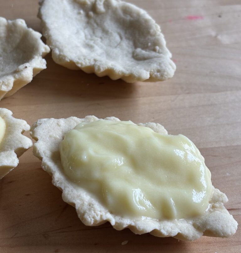 Homemade diamond shaped tart filled with pudding