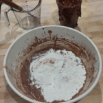 Adding all purpose flour to chocolate sourdough