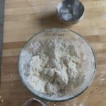 Sourdough Pie Crust with a smaller bowl next to it with water and ice cubes
