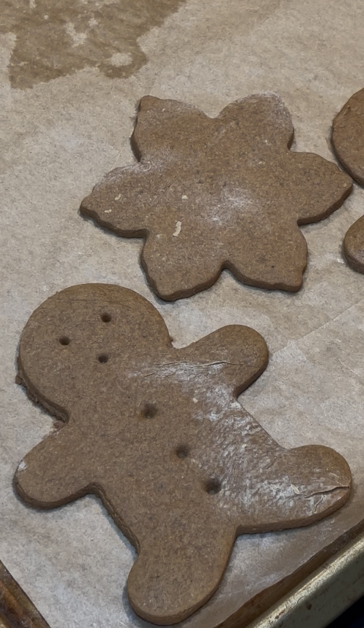 Homemade Sourdough gingerbread cookies on a parchment paper