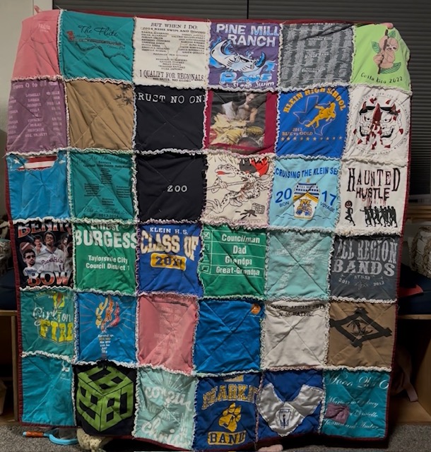 Front of the homemade rag quilt using a t-shirt.